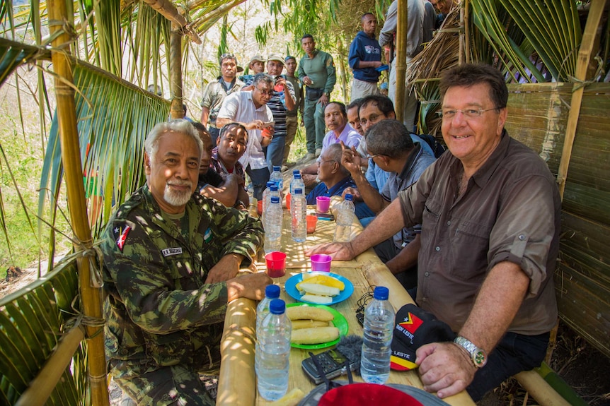 Xanana Gusmao and Robert Domm at table