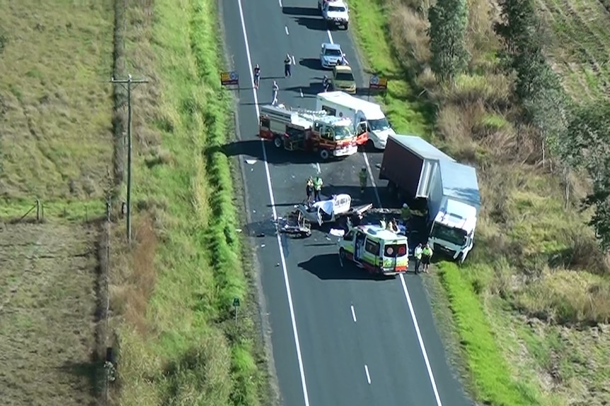 An accident on the Bruce Highway north of Yalboroo, where a ute clipped a car before colliding with a truck.