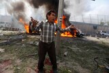 An Afghan man reacts at the site of a blast in Kabul, Afghanistan May 31, 2017.