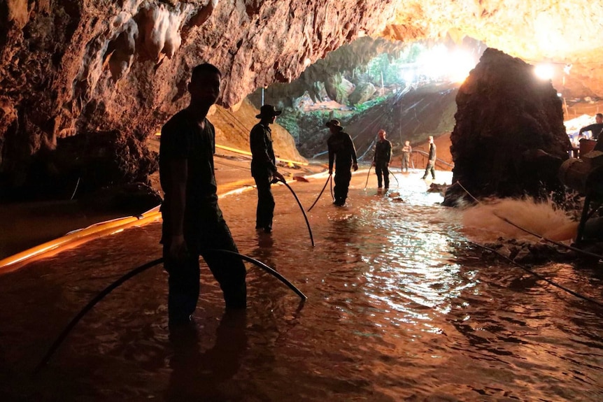 Crews pump out water from Thai cave