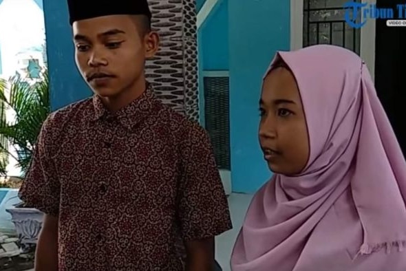 A screengrab of an Indonesian news story shows a young couple.