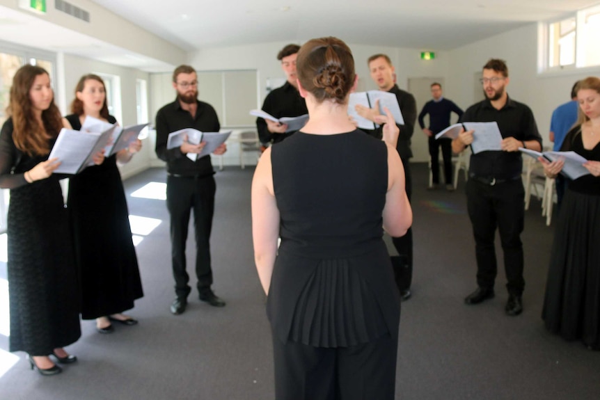 Kate Oliver conducts a rehearsal ahead of her debut.