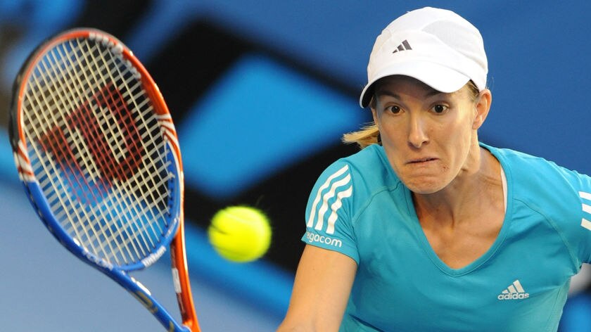 Henin volleys in second-round win