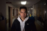 Terry Vo stands in a corridor at PMH where he spent six months as a child.