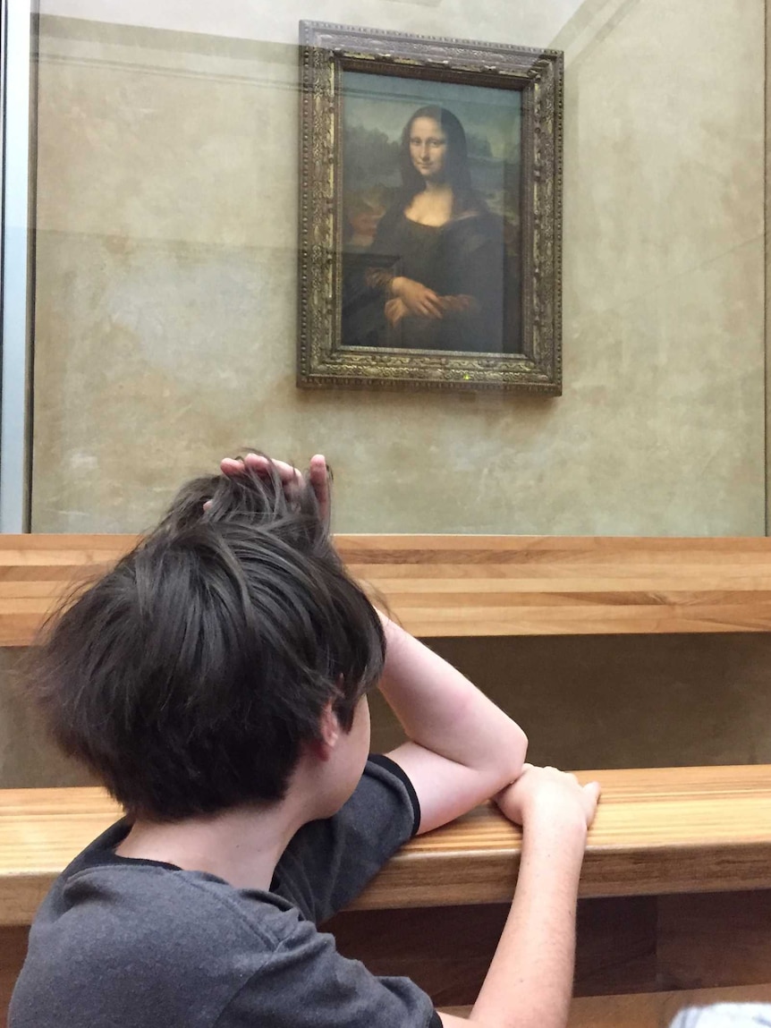 Poppy getting a close look at the Mona Lisa
