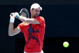 Novak Djokovic hits a shot