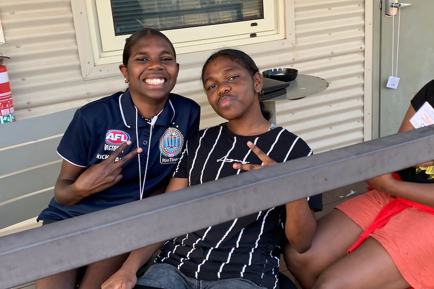 Two young Indigenous school kids at the Howards Springs quarantine facility.