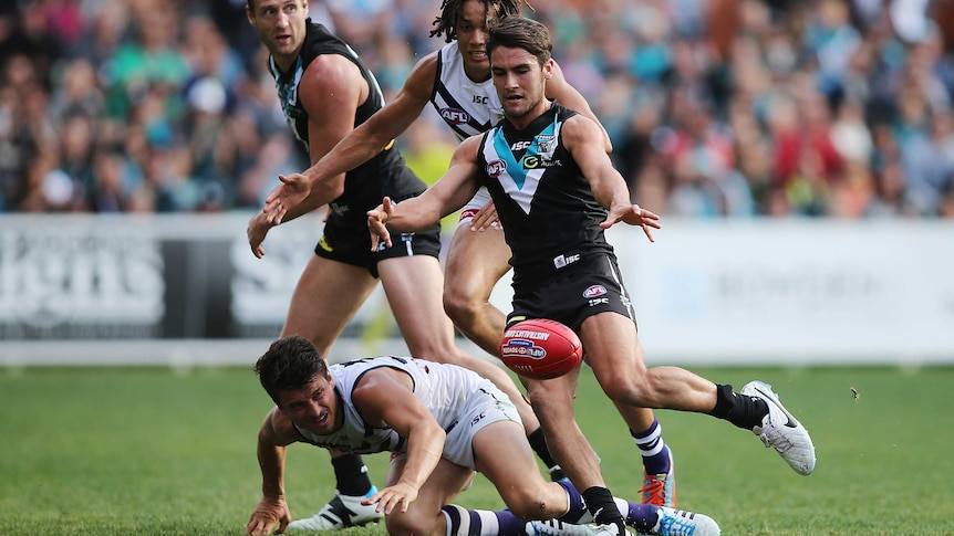 The Power's Chad Wingard kicks for goal against Fremantle at Adelaide Oval.