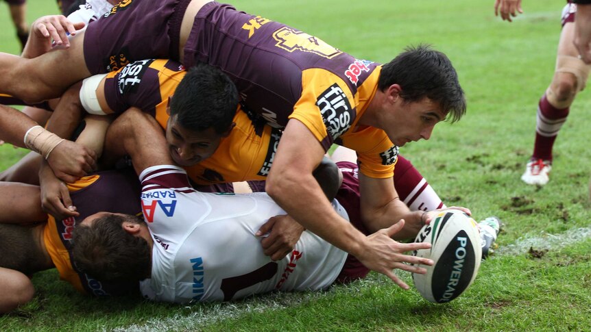 Brisbane's Lachlan Maranta dives over for a try in the Broncos' big win over Manly.