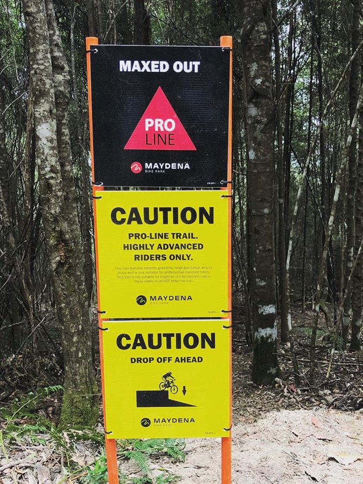 Warning sign at Maydena Bike Park, Tasmania.