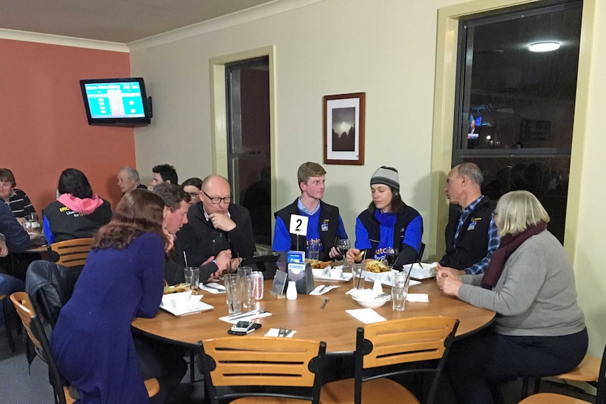 A sombre Eric Hutchinson and his supporters on election night.