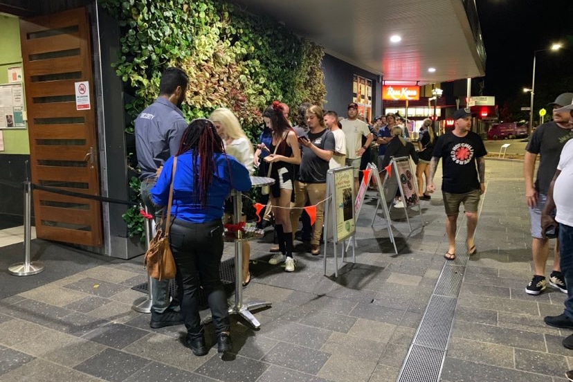 People lining up outside nightclub in Mackay. 