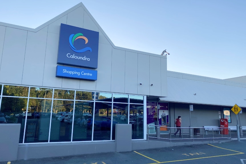 Outside view of a shopping centre, showing its main entrance