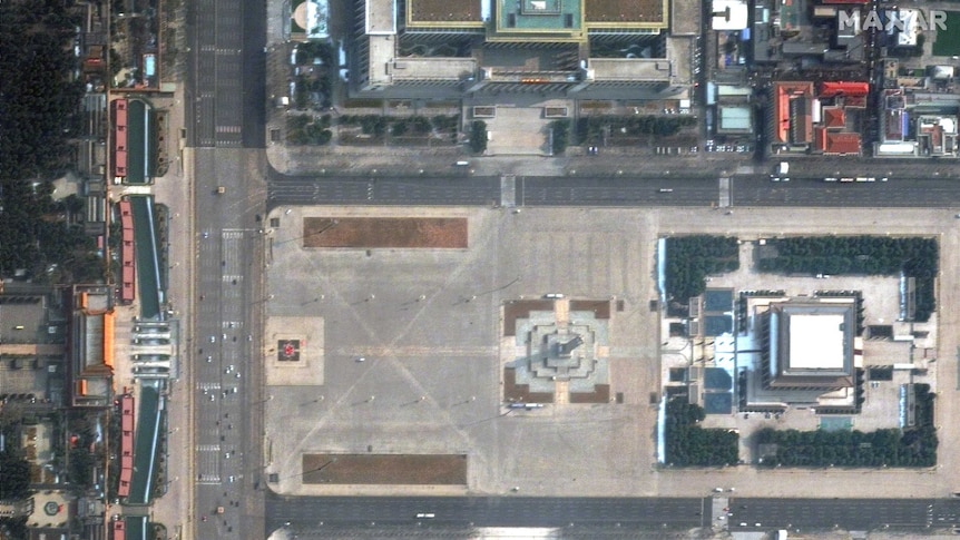 Satellite imagery shows Tiananmen Square and surrounding streets deserted.