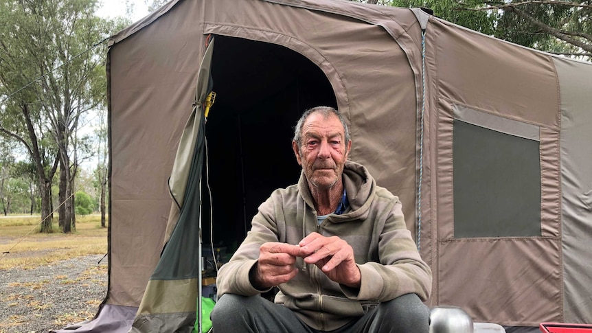 A man at a campsite