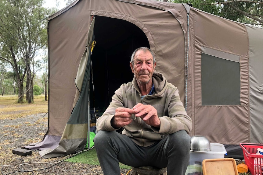 A man at a campsite