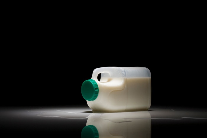 Leaking milk jug  (Getty Images:  Jupiterimages)