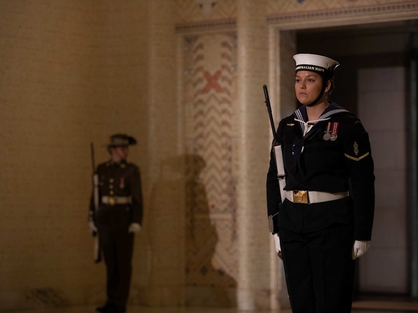 A soldier stands to attention at the Australian War Memorial.