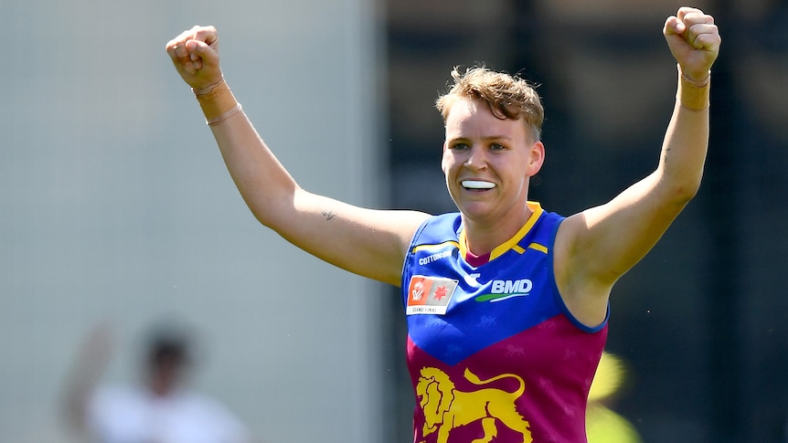 A Brisbane Lions AFLW player celebrates a goal in the grand final against the Kangaroos.