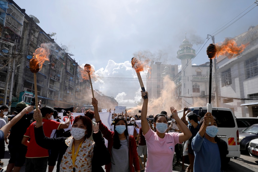 Protesters with fire. 