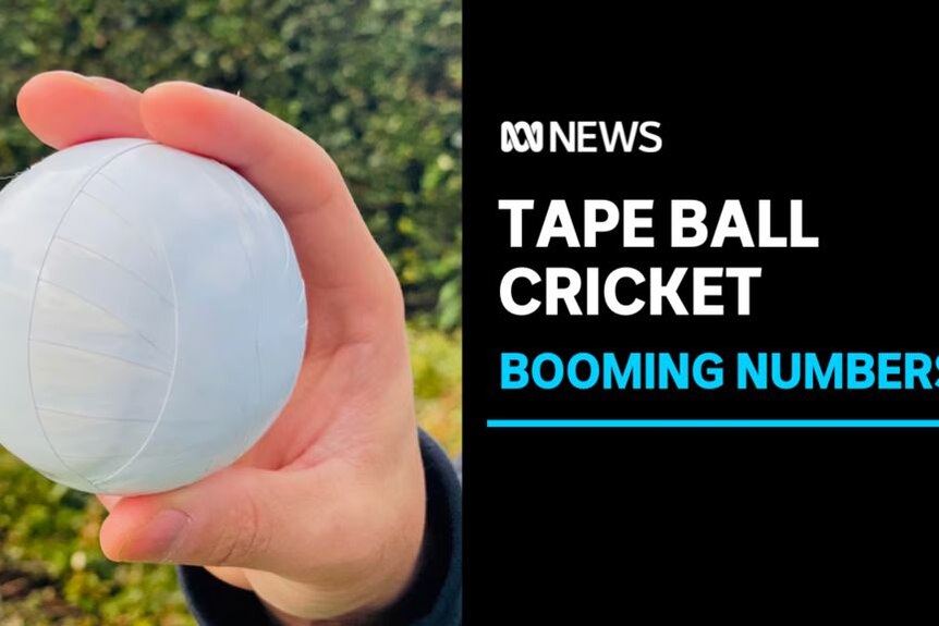 Tape Ball Cricket, Booming Numbers: A hand holding a ball wrapped in white electrical tape.