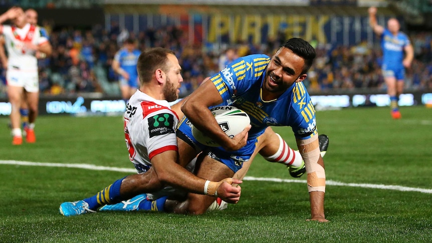 Bevan French scores against the Dragons