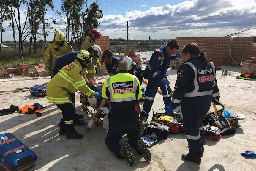 Paramedics treat young man