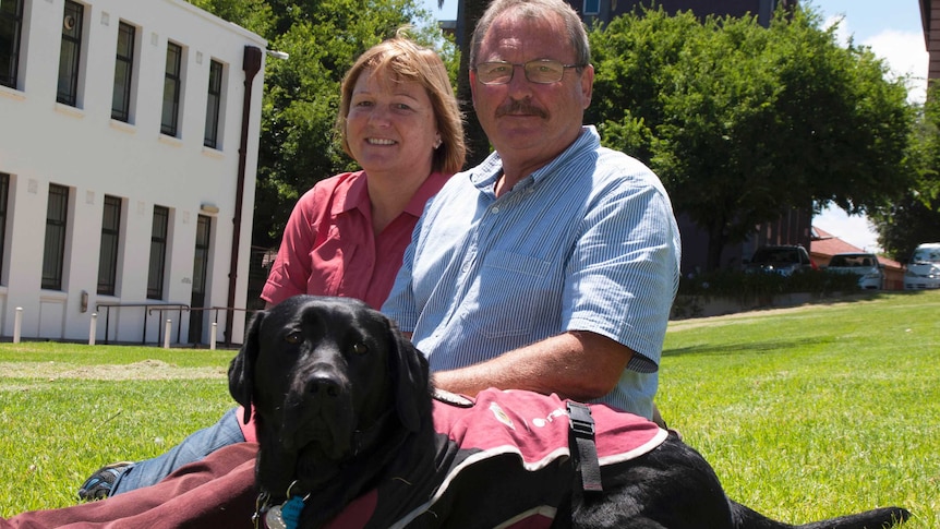 Major Peter Checkley, Jenny Checkley and Ruby the assistance dog.