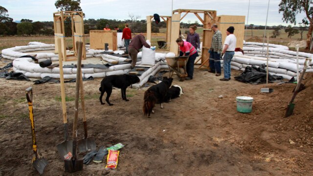 Volunteers gather to help build the Kendenup earth bag home