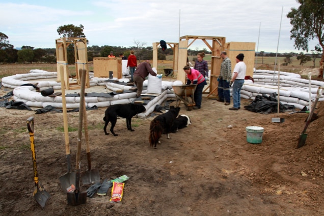 Volunteers gather to help build the Kendenup earth bag home