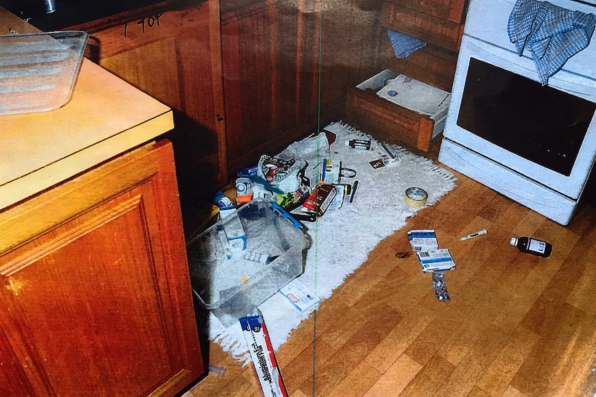 Alan Taylor's kitchen with items strewn across the floor in an attempt to make it look like a burglary.