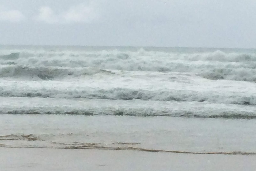 Rough surf washing in to a beach