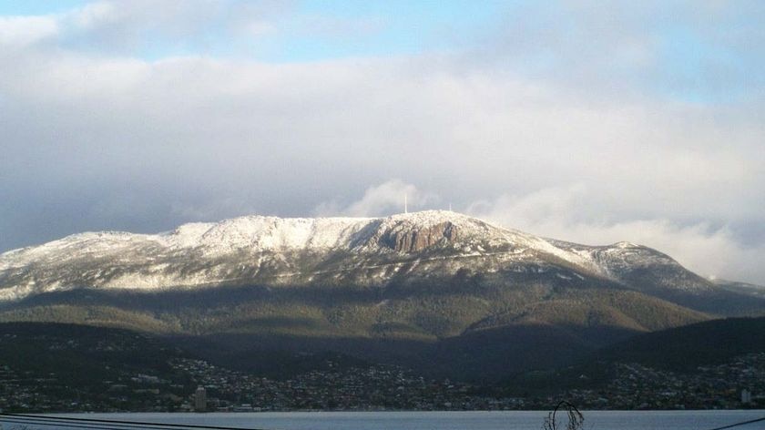 A layer of snow covers the peak of Mt Wellington