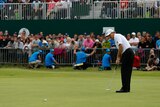 Els putts to win the British Open