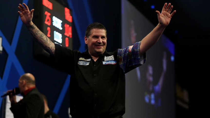 Scotland's Gary Anderson celebrates after winning the 2015 PDC World Darts Championships in London.