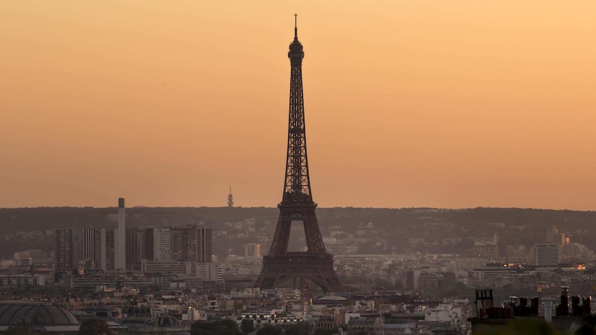 The Eiffel Tower pictured at dusk.