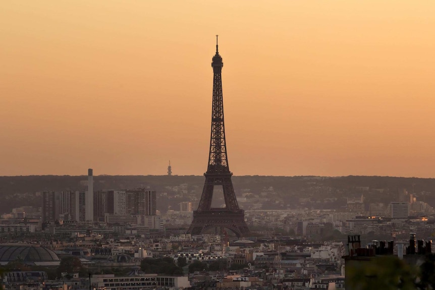 The Eiffel Tower pictured at dusk.