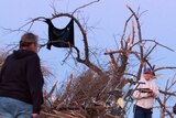 Illinois residents sift through tornado wreckage