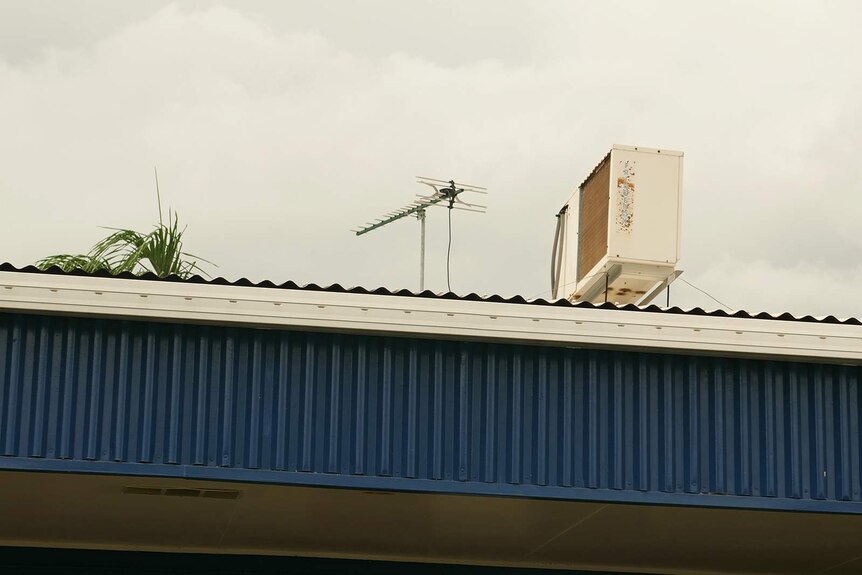 A photo of an air-conditioning unit on a roof in Darwin.
