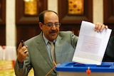 Iraq PM Nuri al-Maliki votes