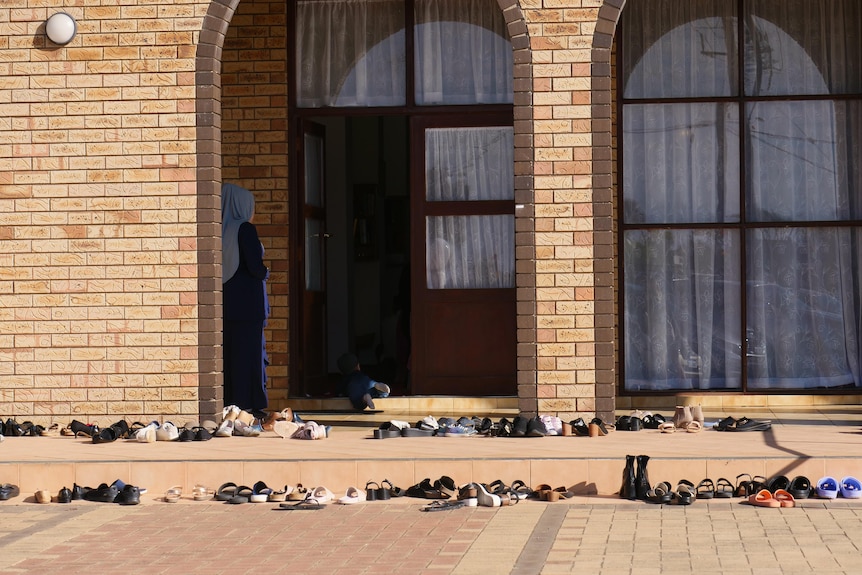 Shoes placed outside a Mosque.