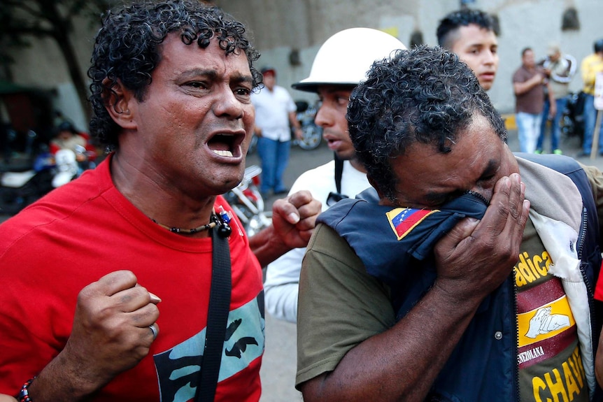 Hugo Chavez supporters react to his death.