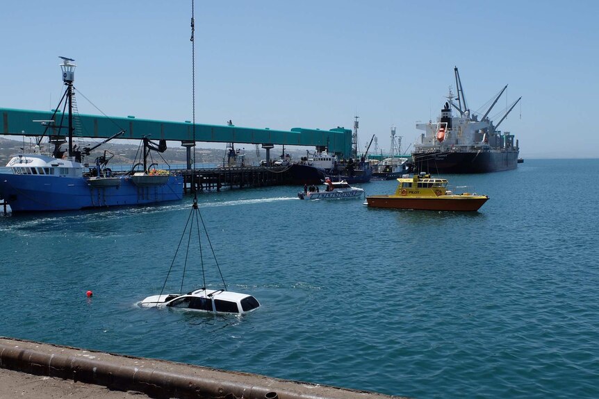 A white station wagon being pulled from the waters off Port Lincoln.