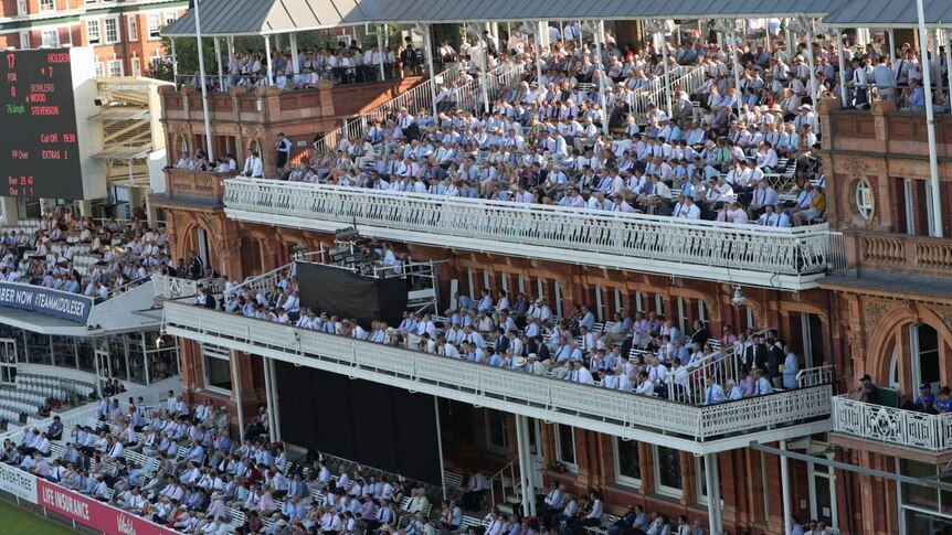 On a balmy night in north west London members at Lord's take advantage of the temporary no jacket require rule.