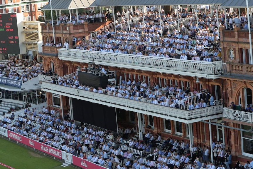 On a balmy night in north west London members at Lord's take advantage of the temporary no jacket require rule.