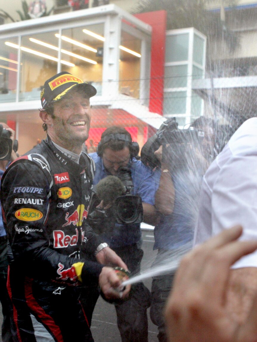 Mark Webber celebrates his second victory around the infamous street circuit.