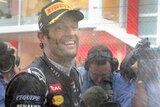 Mark Webber celebrates his second victory around the infamous street circuit.