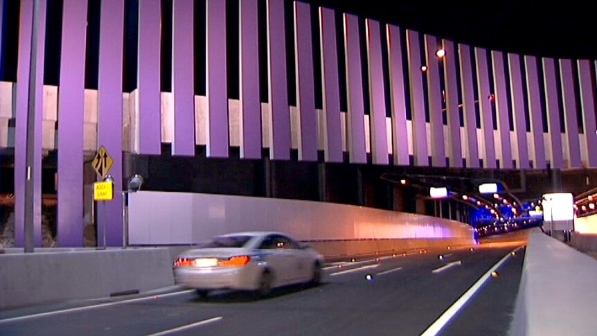 A car enters the Airport Link tunnel in Brisbane after it was opened on July 24, 2012.