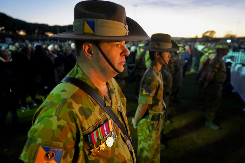 Men in the uniform of the Australian Defence Force at a dawn service.