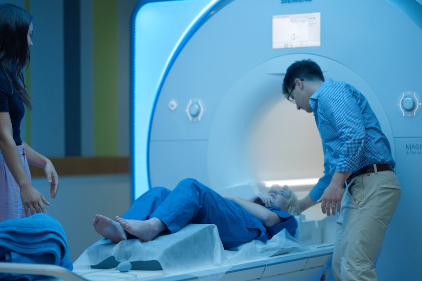 A young person is put into an MRI machine